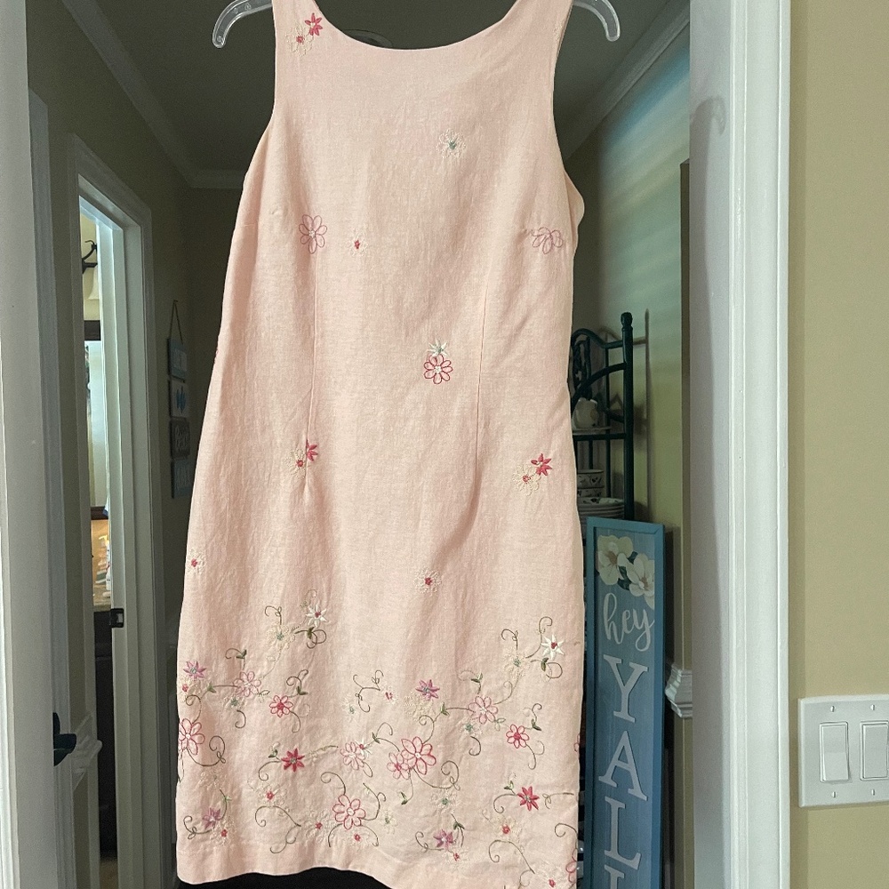 Very pretty Orange dress with flowers.
